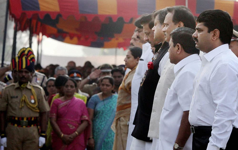 Maharashtra CM Prithviraj Chavan, Deputy CM Ajit Pawar and Union Minister of State for Human Resource Development Shashi Tharoor and others paying homage to the martyrs and victims of 26/11 terror attacks at a memorial at Police Gymkhana in Mumbai on Tuesday on the occasion of fifth anniversary of the gruesome incident.