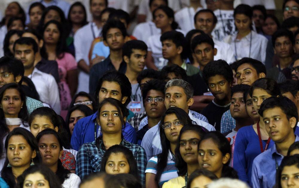 People participate in a gathering to pledge for peace ahead of the fifth anniversary of the 2008 Mumbai terror attack Friday, in Mumbai.