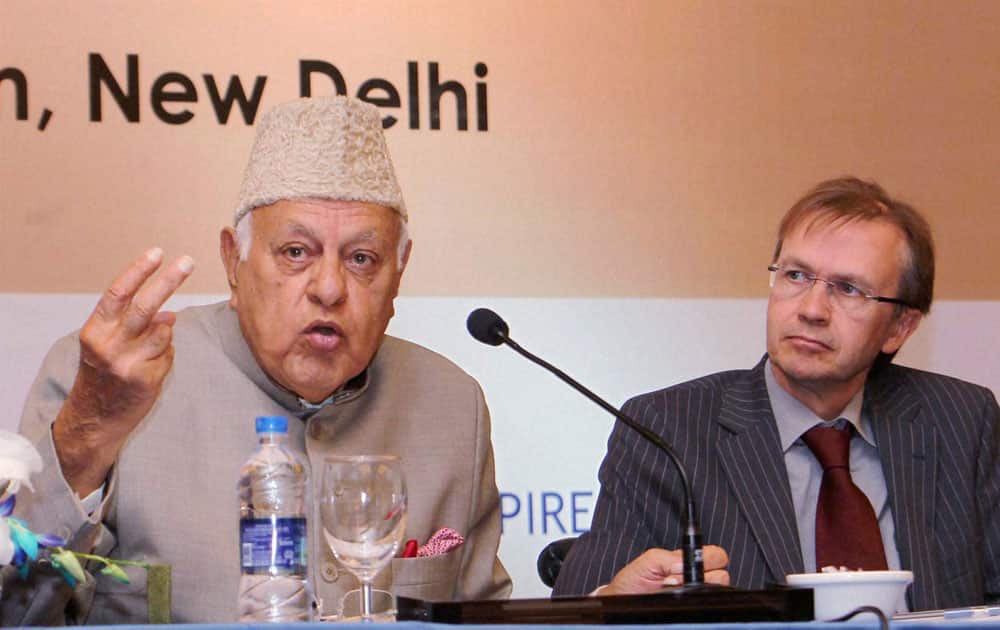 Dr Farooq Abdullah, Minister of New and Renewable Energy addresses the India Clean Cookstove Forum 2013, also seen is Heiko Warnken, Head of the Development Cooperation, German Embassy in New Delhi.