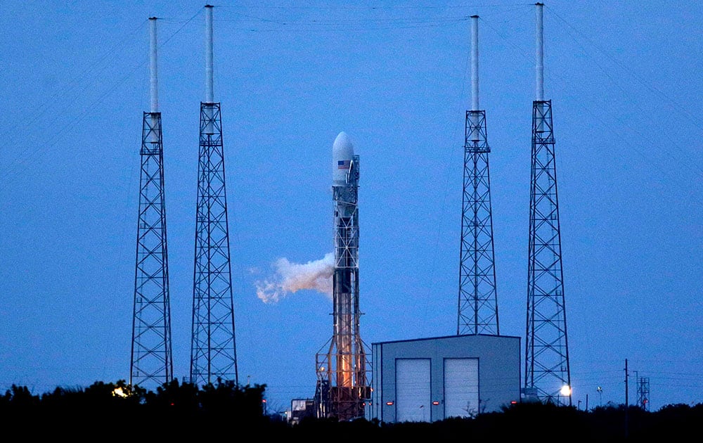 A Falcon 9 SpaceX rocket sits on Launch Complex 40 just before the launch window opened at the Cape Canaveral Air Force Station in Cape Canaveral, Fla.