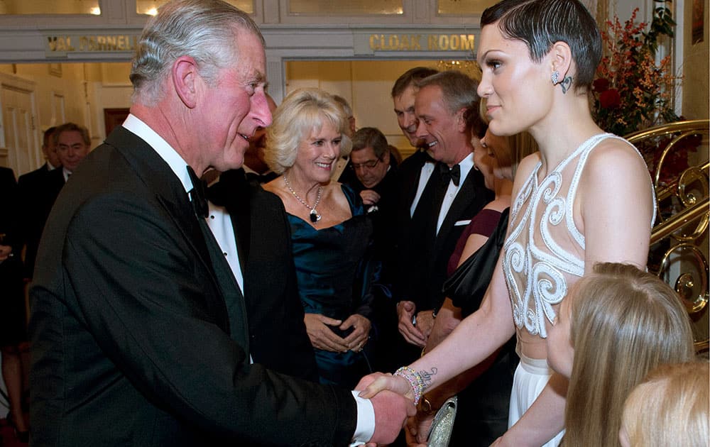 The Prince of Wales meets with British singer songwriter Jessie J before the Royal Variety Performance, at the London Palladium, in central London.