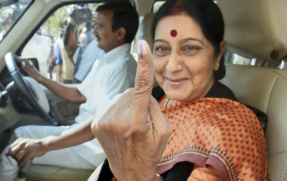 BJP leader Sushma Swaraj leaves after casting her vote for Assembly elections in Bhopal, Madhya Pradesh.