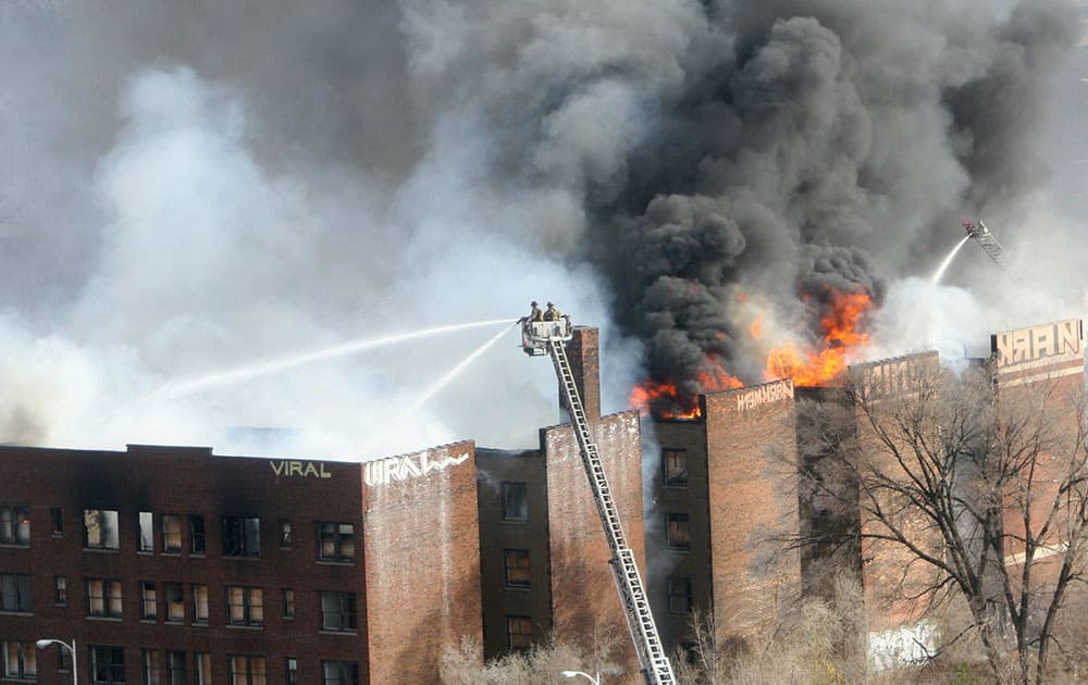 Detroit firefighters battle a blaze In the 1500 block of East Jefferson near downtown Detroit. The fire destroyed the vacant apartment building.