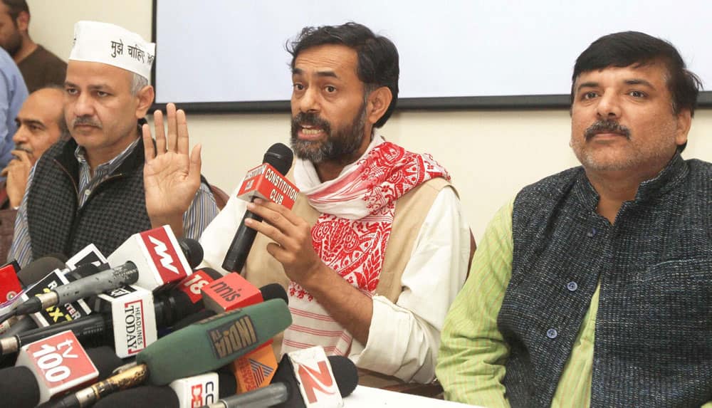 Aam Adami Party (AAP) leaders Manish Sisodia (L), Yogendra Singh Yadav (C) and Sanjay Singh during a press conference in New Delhi.