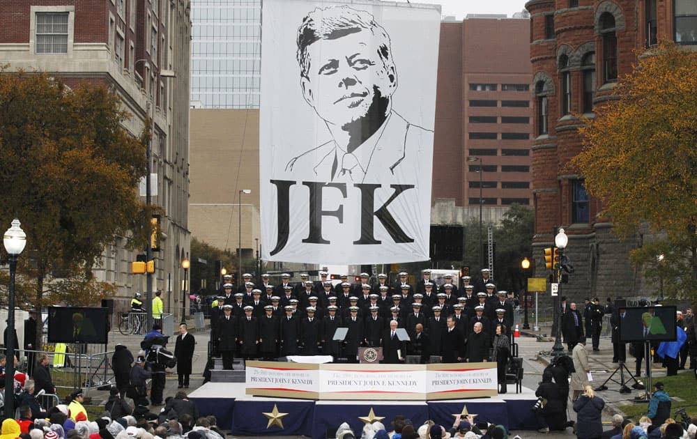 The United States Naval Academy Glee Club performs during a ceremony to mark the 50th anniversary of the assassination of John F. Kennedy.