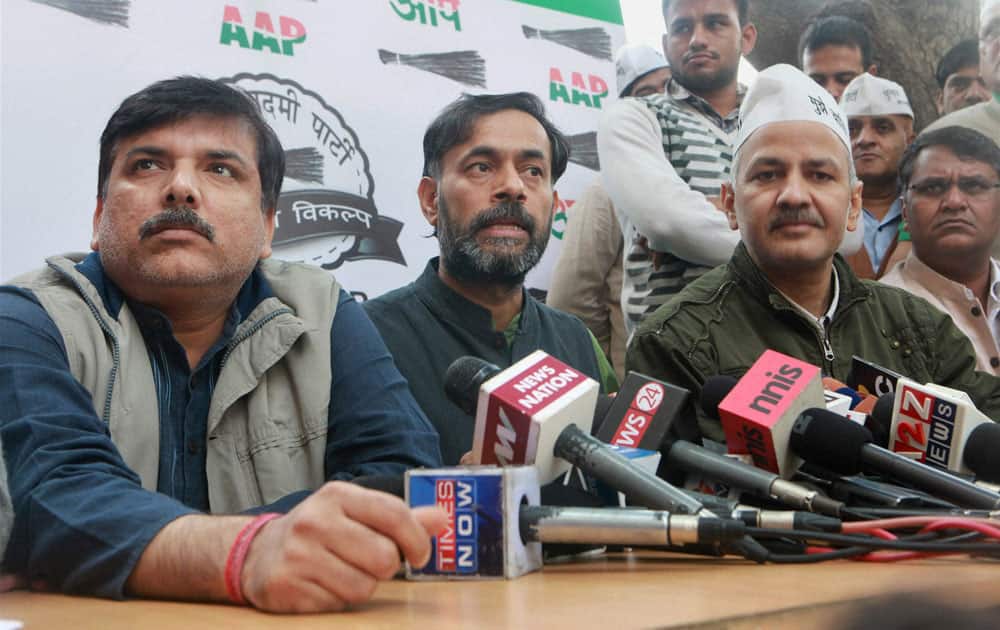 Aam Adami Party (AAP) leaders Manish Sisodia, Yogendra Singh Yadav and Sanjay Singh addresses a press conference in New Delhi.