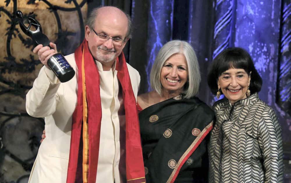 Salman Rushdie being honored by IAAC during their 15th Annual Gala in New York on Thursday.Aroon Shivdasani Dirtector IAAC and Actress Madhur Jaffrey(R) were also seen..