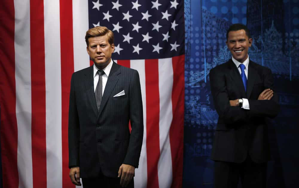 The wax figures of the 35th U.S. President John F. Kennedy and the one of current president Barack Obama are placed in the World Leaders area at Madame Tussauds tourist attraction, in London.
