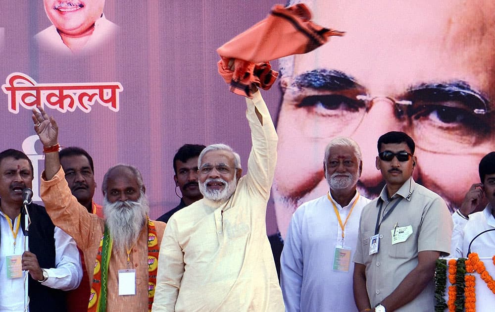 BJP Prime Ministerial candidate & Gujarat Chief Minister Narendra Modi addresses an election rally at Satna, Madhya Pradesh.