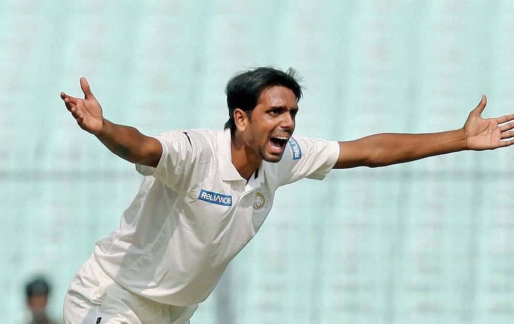 Saurashtra bowler S M Sanandia appeals for the dismissal of Bengal batsman Wriddhiman Saha (not in the picture) during the Ranji Trophy match at Eden Garden in Kolkata.
