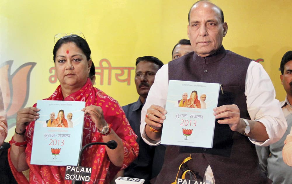 BJP President Rajnath Singh with Rajasthan State President Vasundhra Raje released BJP Manifesto at Party office in Jaipur.