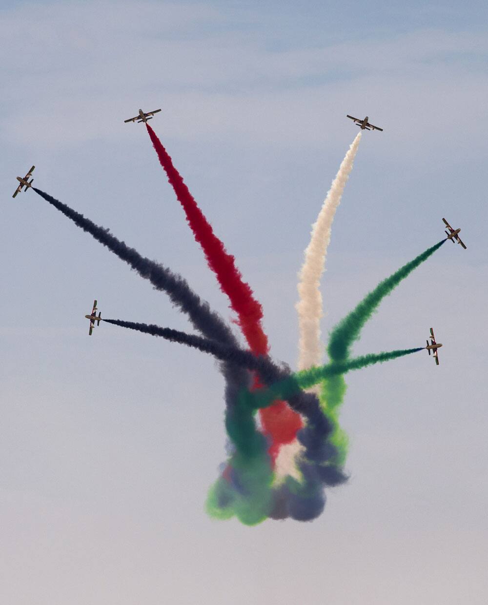 Al Fursan, the aerobatics demonstration team of the UAE Air Force perform during the Dubai Air show, in Dubai.