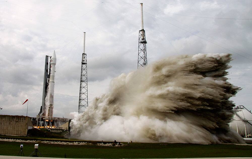 NASA`s Maven, atop a United Launch Alliance Atlas 5 rocket, lifts off from Cape Canaveral Air Force Station, in Cape Canaveral, Fla. The spacecraft will orbit Mars and study the planet`s upper atmosphere.