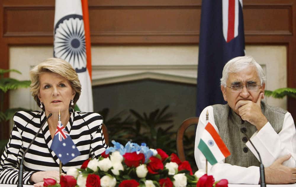 External Affairs Minister Salman Khurshid looks on as his Australian counterpart Julie Bishop speaks during a joint press conference at Hyderabad house in New Delhi.