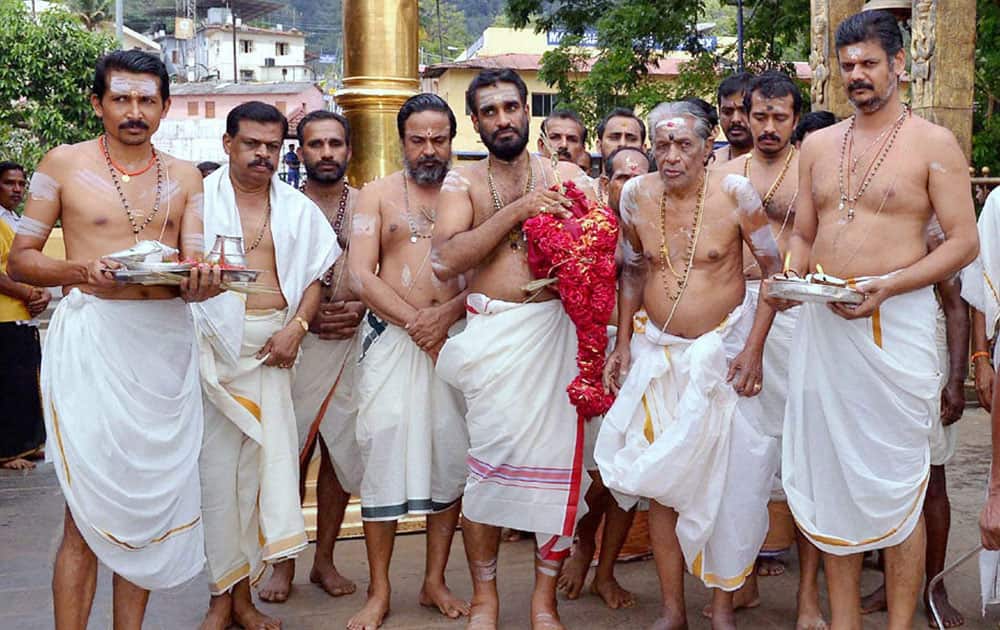 Chief priest PN Narayanan Namboothiri and Thantri Kandararu Maheswararu preparing for ‘Kalababhishekam’ at Lord Ayyappa temple in Sabarimala.
