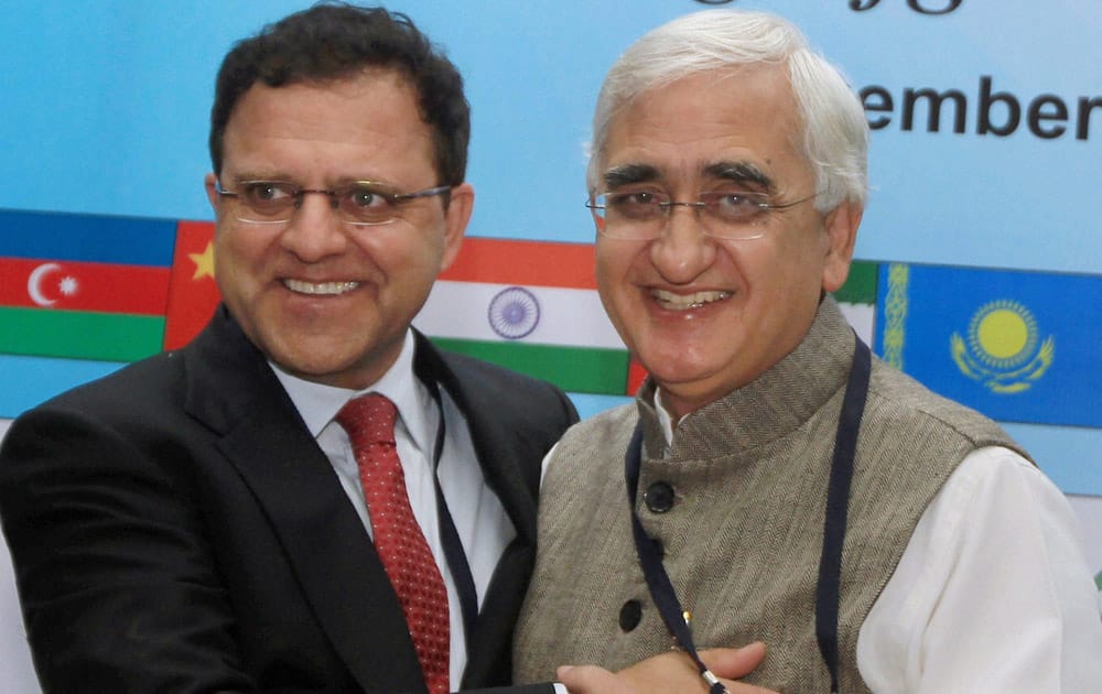Foreign Minister Salman Khurshid with Afghanistan Finance Minister Hazarat Omar Zakhilwal during the conference.