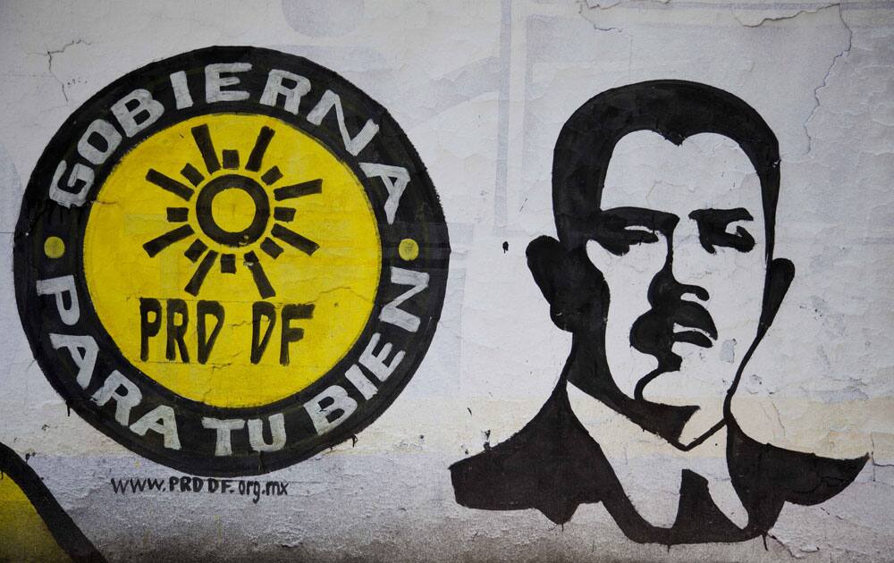 A mural of Mexico`s former President Lazaro Cardenas covers a wall as part of propaganda from the PRD political party in Mexico City.