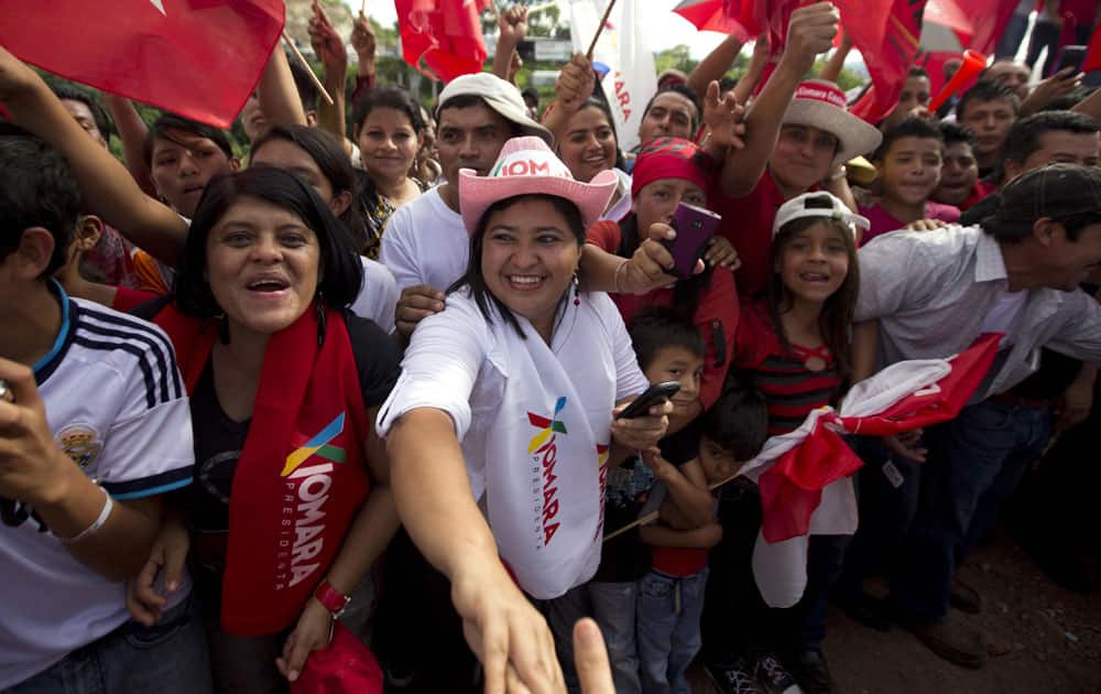 Supporters of presidential candidate Xiomara Castro attend her closing campaign rally in Tegucigalpa.