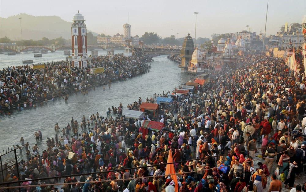 Devotees gather to take a holy dip in the river Ganga on the occasion of Kartik Poornima at Har Ki Pauri in Haridwar.