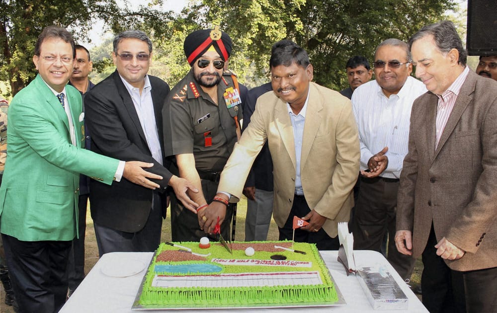Army Chief General Bikram Singh, with former Jharkhand Chief Minister Arjun Munda, Tata Steel Managing Director, T V Narendran and his predecessor H M Nerurka, during the inauguration of 8th hole at Golmuri Golf Course, in Jamshedpur.