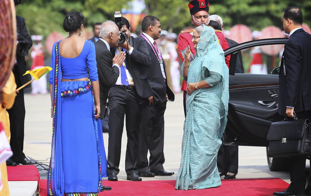 Bangladesh Prime Minister Sheikh Hasina arrives at the Nelum Pokuna Mahinda Rakapaksa theater, the main venue for the opening ceremony of the Commonwealth Heads of Governments meeting, in Colombo, Sri Lanka.