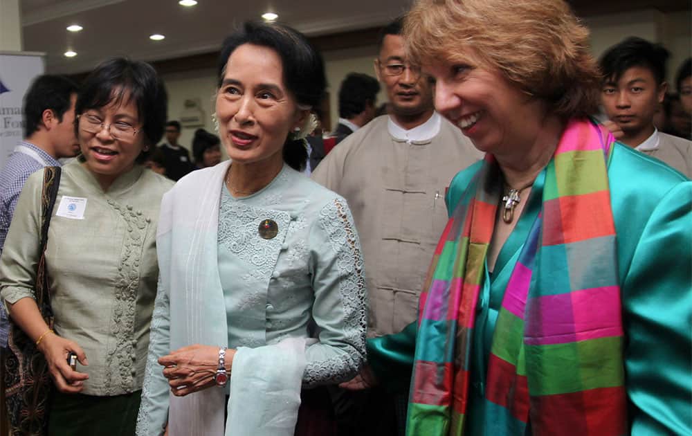 Myanmar Opposition Leader Aung San Suu Kyi, left, and top EU diplomat Catherine Ashton, right, attend the opening ceremony of the first EU-Myanmar Task Force in Yangon, Myanmar.