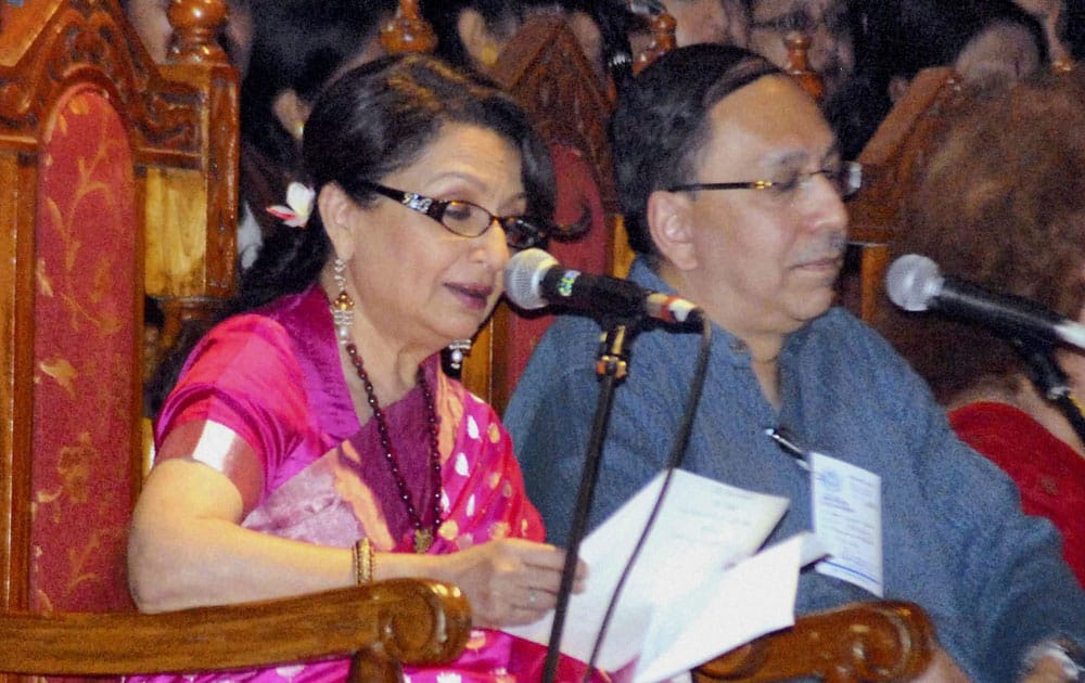 Veteran Bollywood actress Sharmila Tagore recites as Sugata Bose (R), grand nephew of Netaji Subhash Chandra Bose, looks on during a function to celebrate centenary of Tagore`s Nobel Prize in India.