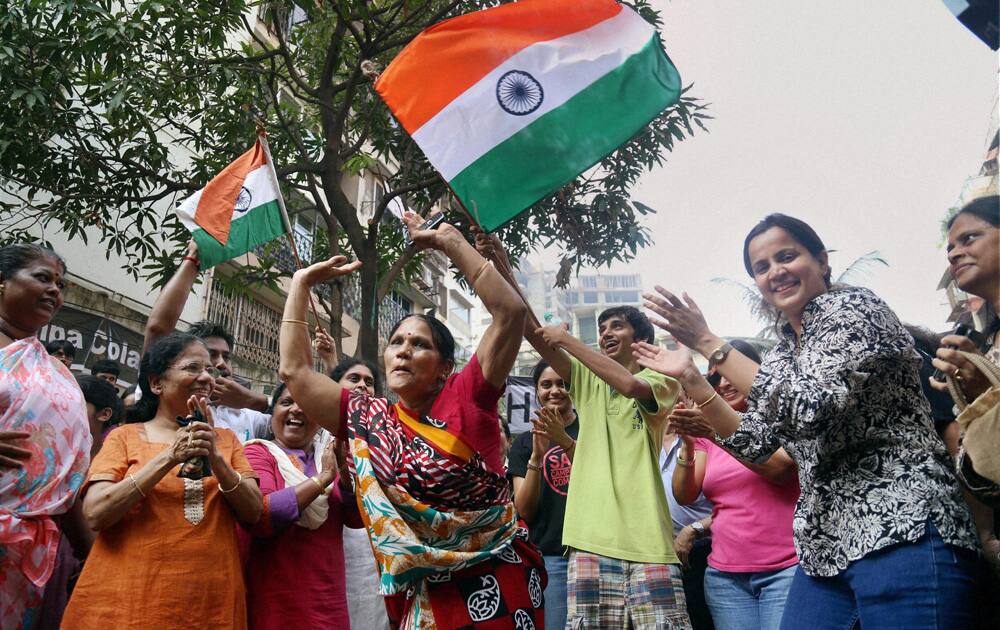 Residents of Campa Cola housing colony jubilate after the Supreme Court issued orders to stay the demolition of their houses in Mumbai.