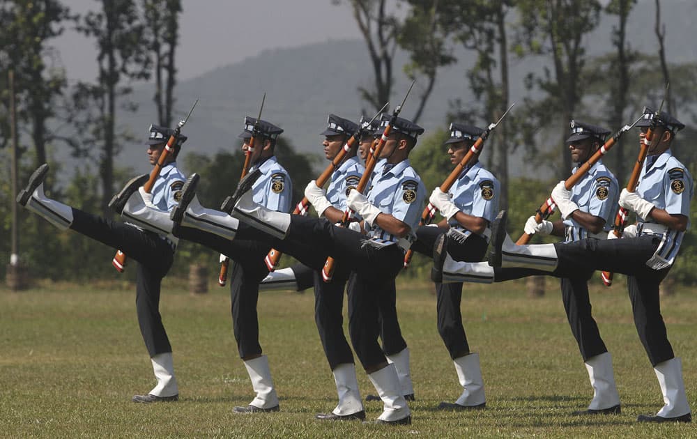 Indian Air force personnel perform a drill during raising day celebrations of the Sainik School at Goalpara, Assam state.