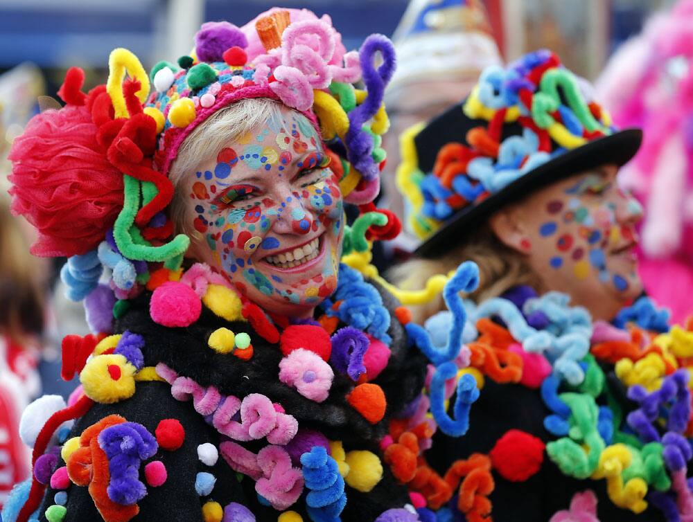 Fools celebrate in the streets of downtown Duesseldorf after the symbolic awakening of the Hoppeditz, the symbol for carnival.