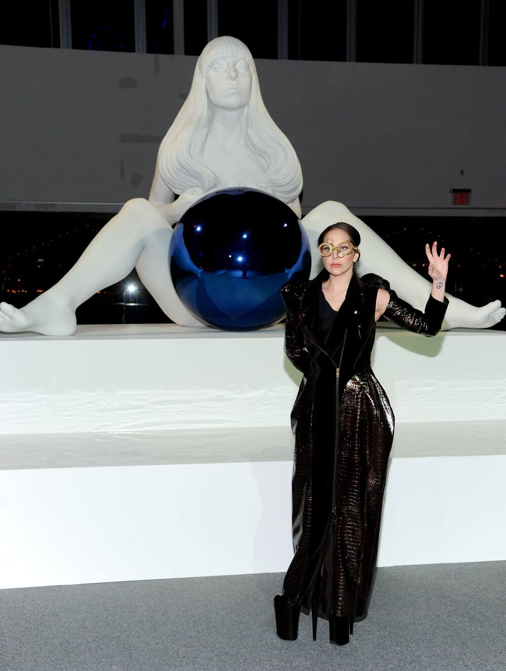 Lady Gaga unveils a sculpture of herself by artist Jeff Koons during the ARTPOP album release and artRave event at the Brooklyn Navy Yard.