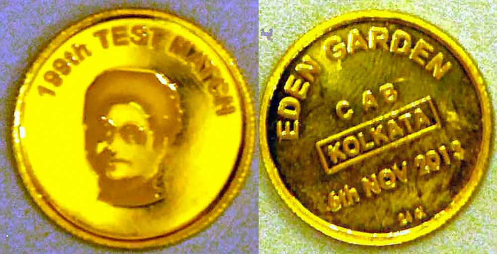 Combo- Both sides of gold coin unveiled of master blaster Sachin Tendulkar on the eve of his 199th Test match during a programme in Kolkata on Tuesday. The gold coin will be used to toss the Test match.