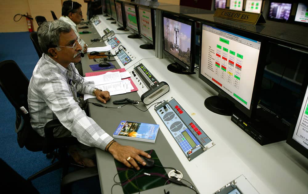 A technician monitors the functions of the Polar Satellite Launch Vehicle (PSLV-C25) at the Satish Dhawan Space Center at Sriharikota, in the southern Indian state of Andhra Pradesh.