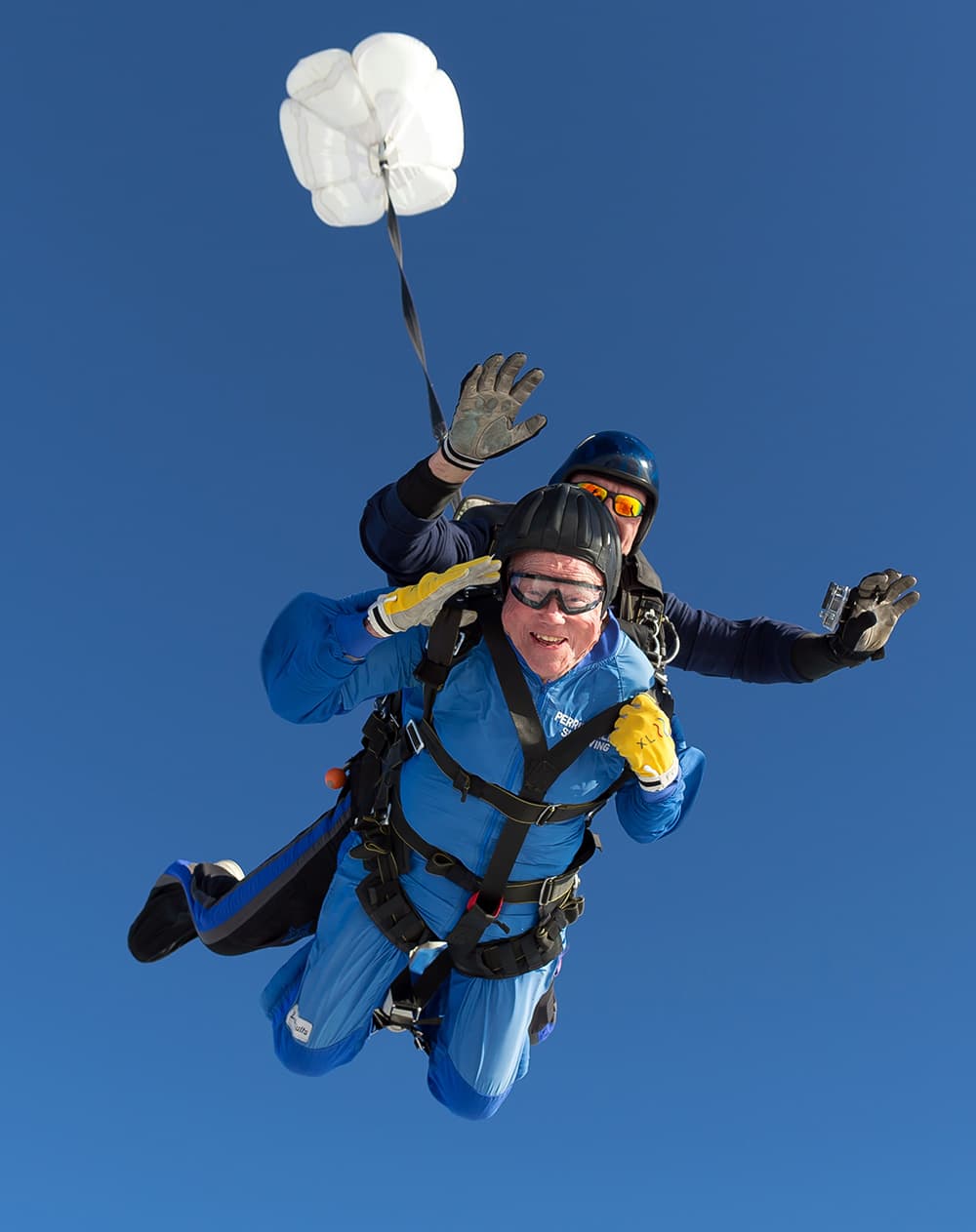 Vernon Maynard, bottom, skydives with instuctor James Perez to celebrate his 100th birthday over Perris, Calif.