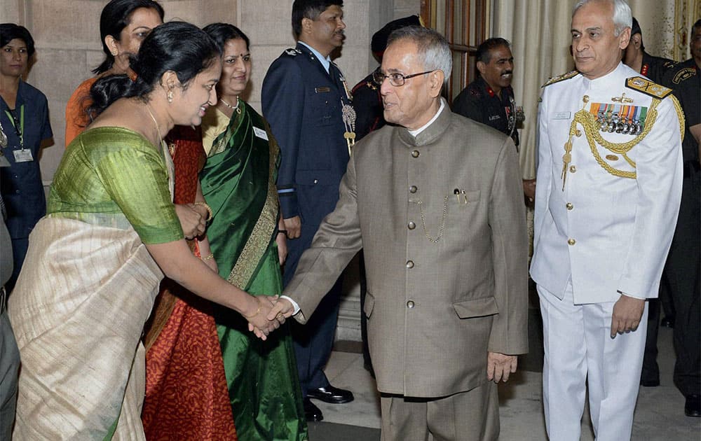 President Pranab Mukherjee greets members of 53rd NDC Course & Faculty of National Defence College at Rashtrapati Bhavan in New Delhi.