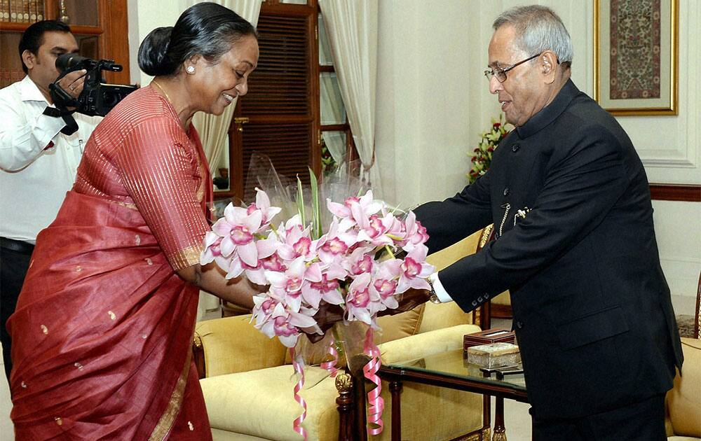 Lok Sabha Speaker Meira Kumar greeting President Pranab Mukherjee on Diwali at Rashtrapati Bhavan in New Delhi.