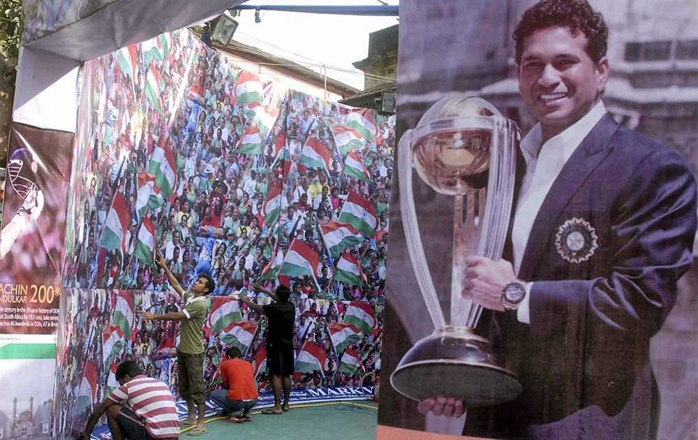 Cricket fans make a goddess Kali puja pandal for the success of the Indian cricket team and the milestone of master blaster Sachin Tendulkar during Kali puja and Diwali festivals ahead of upcoming test matches of India and Sachins`s 199th Test match at Eden Gardens,in Kolkata.