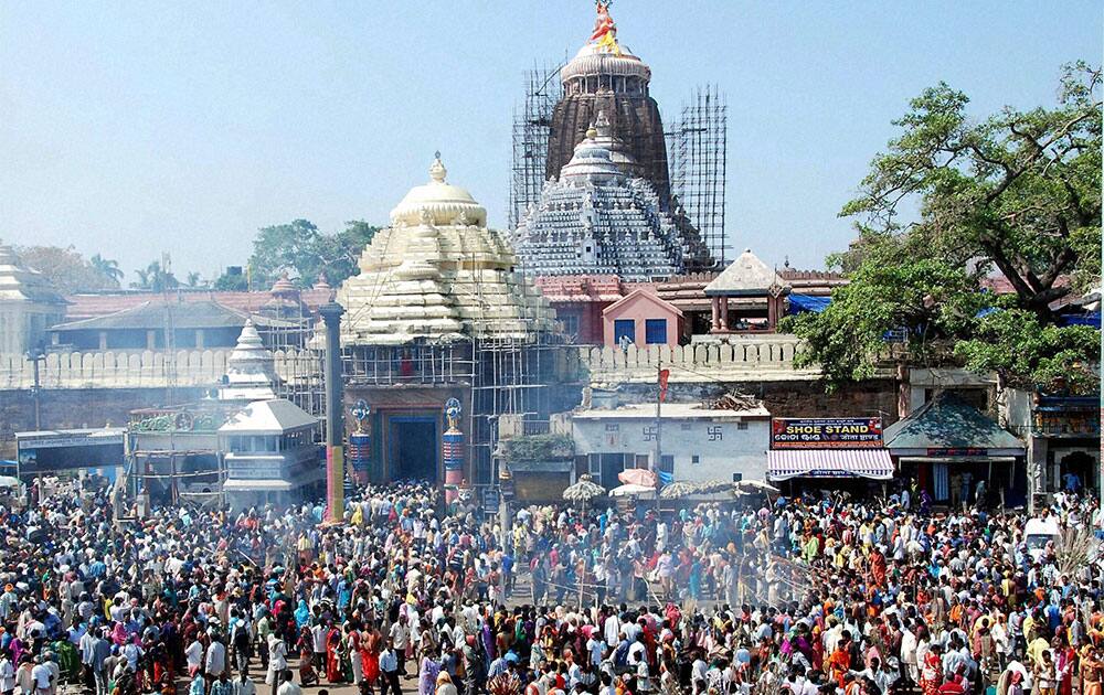 Devotees witnessing the rituals being performed at the Lord Jagannath temple to pay homage to their ancestors in Puri, on the occasion of Diwali.