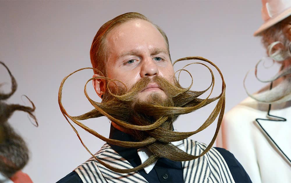 US participant Justin Kellermeister poses at the `Beard and Moustache World Championships` in the category full beard freestyle, in Leinfelden-Echterdingen , southern Germany.