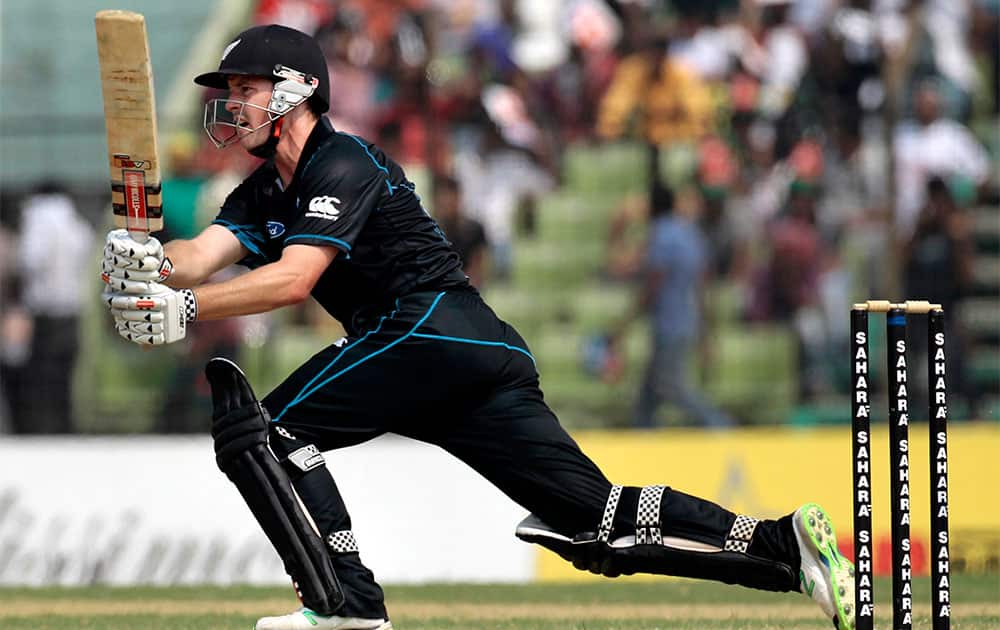New Zealand`s batsman Colin Munro watches his shot during the third one-day international cricket match against Bangladesh in Fatullah, Bangladesh.