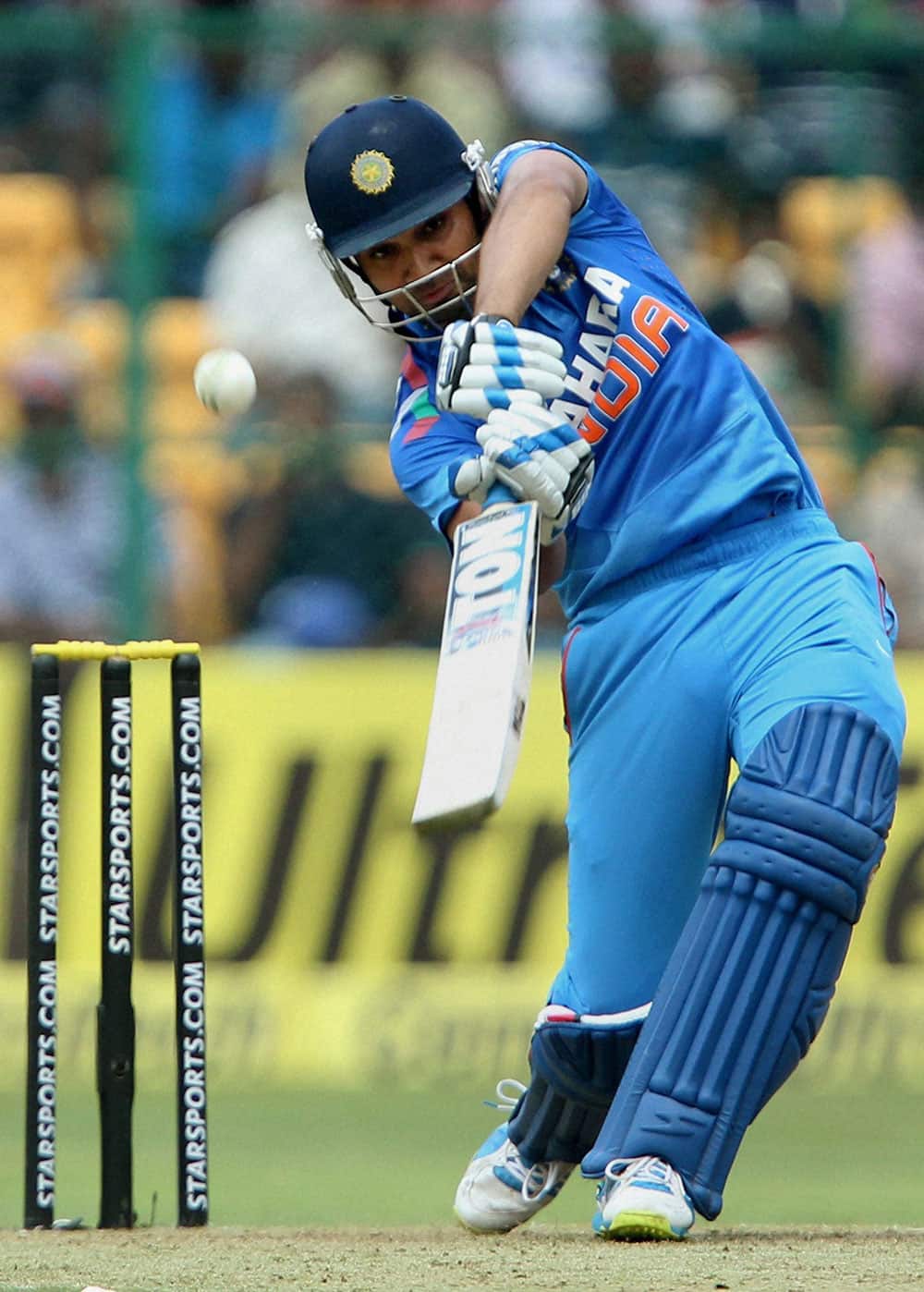 Rohit Sharma plays a shot during the 7th ODI against Australia at Chinnaswamy stadium in Bengaluru..