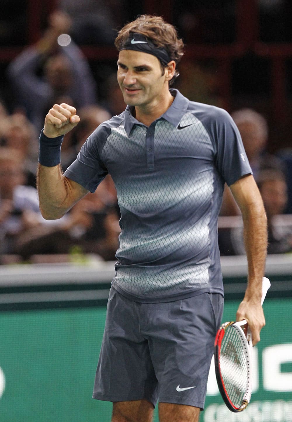 Switzerland`s Roger Federer reacts after winning his match against Argentina`s Juan Martin Del Potro at the Paris Masters tennis, in the Paris Bercy stadium.
