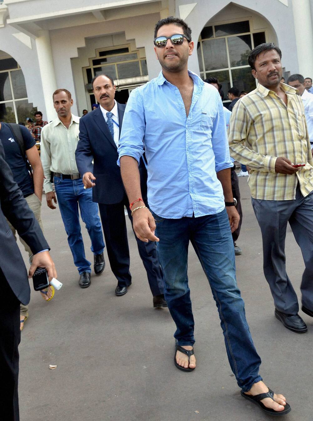 Yuvraj Singh arrives at the airport in Jodhpur on Thursday to attend Nita Ambani`s 50 birthday bash.