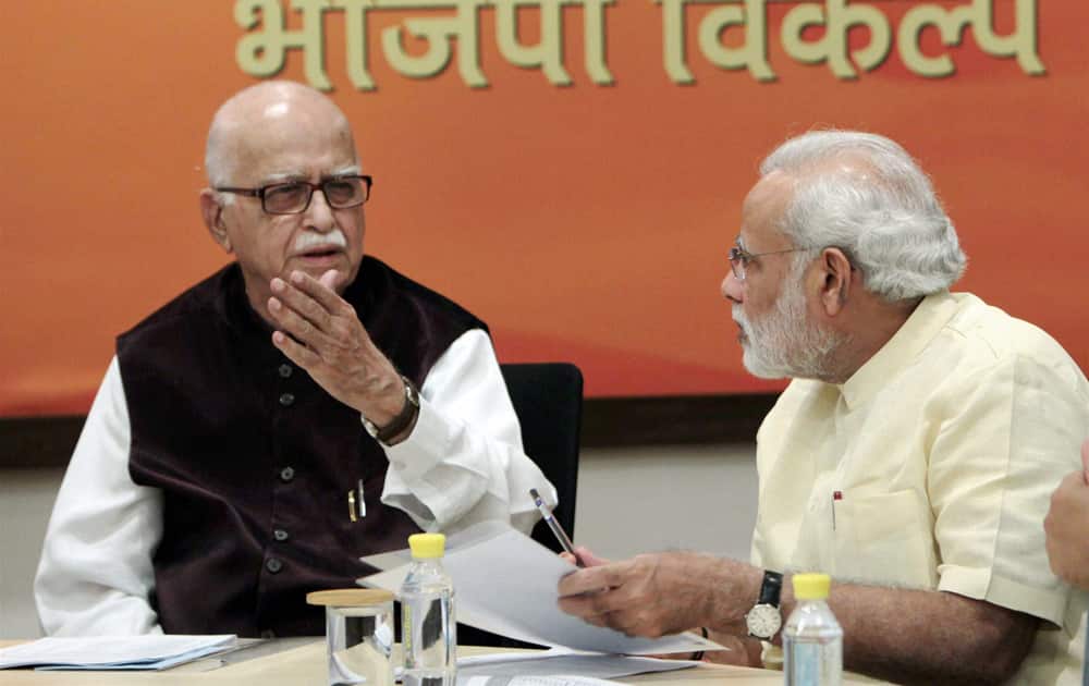 L K Advani with Gujarat Chief Minister Narendra Modi at the party`s Central Election Committee meeting in New Delhi.