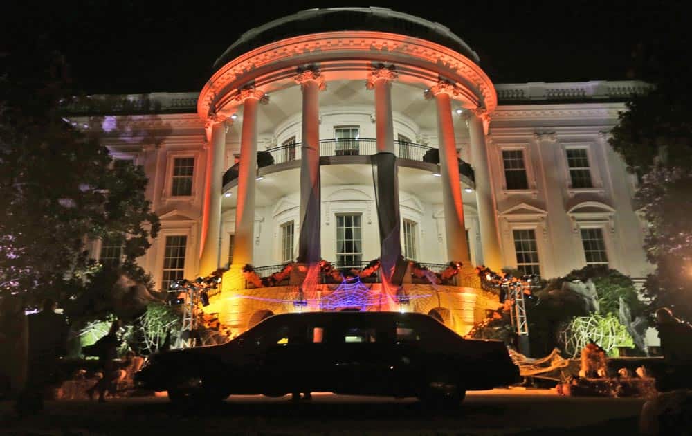 This photo shows the South Portico of the White House in Washington decorated and lit in orange lights in preparation of tomorrow`s Halloween celebration.