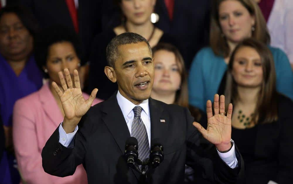 President Barack Obama speaks at Boston`s historic Faneuil Hall about the federal health care law.