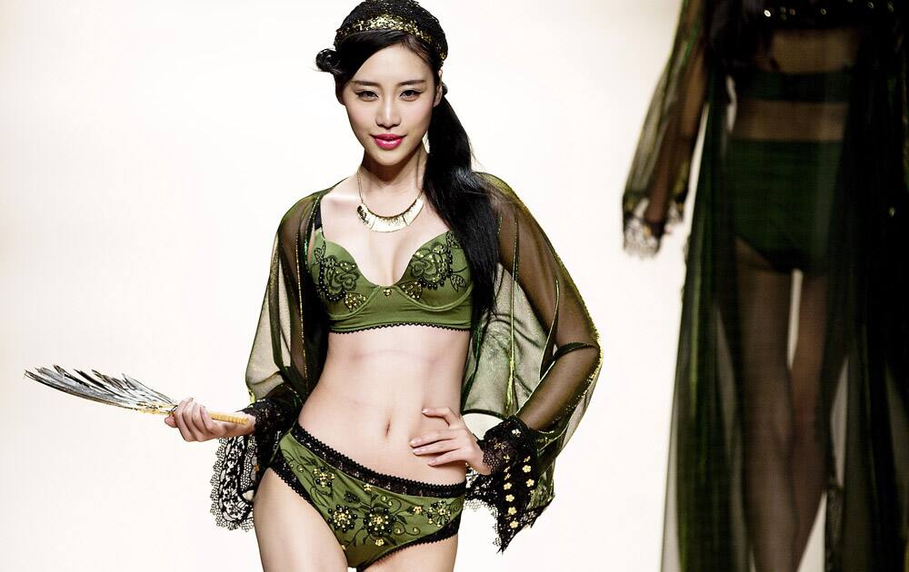 A model presents a creation by Chinese designer Gao Haibing during the Ordifen Cup lingerie design contest at the China Fashion Week in Beijing.