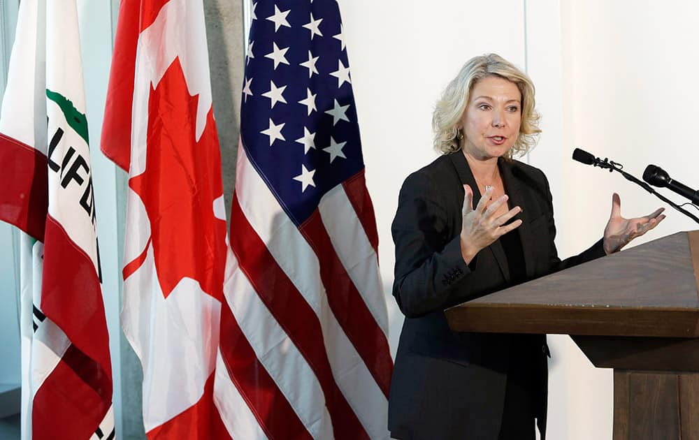 Mary Polak, environment minister of British Columbia, representing British Columbia premier Christy Clark, speaks before signing a joint agreement with the governors of California, Washington and Oregon, to collectively combat climate change in San Francisco.