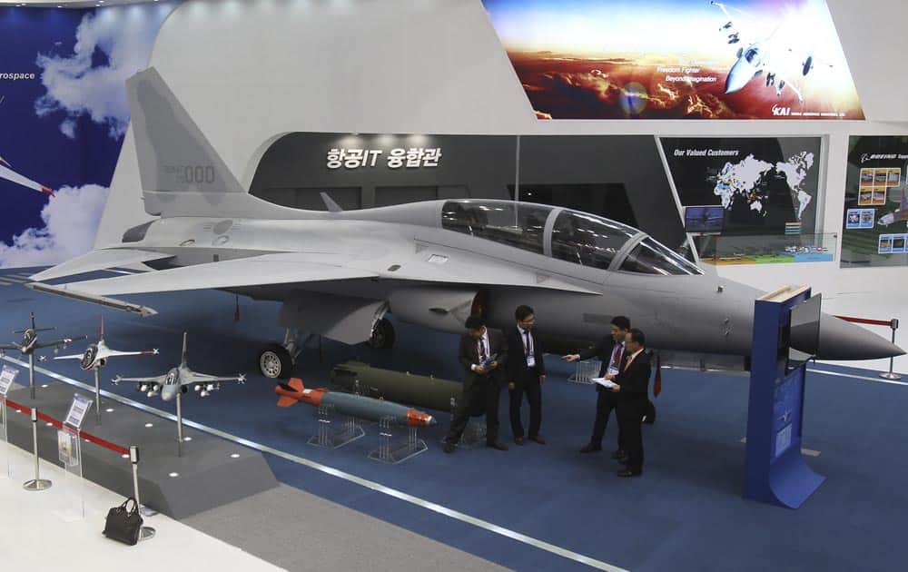 South Korea`s FA-50 fighter jet is displayed at the firm`s booth during a media day of Seoul International Aerospace and Defense Exhibition (ADEX) 2013 in Goyang, South Korea.