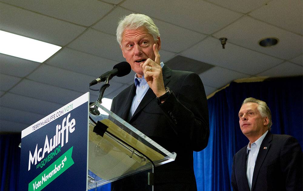 Former President Bill Clinton campaigns for Democratic gubernatorial candidate for Virginia, Terry McAuliffe, right, at a